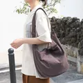 Chic Japanese style brown plaid canvas dumpling bag for women stylish casual crossbody bag - Brown