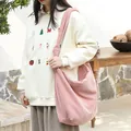 Pink corduroy crossbody bag with stylish knot strap and casual minimalist design. - Pink