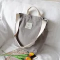 Minimalist gray canvas shoulder bag with large capacity and cream straps for daily use - Gray