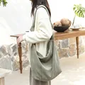 Large olive green corduroy hobo bag with knotted shoulder strap for casual styling - Green