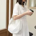 Minimalist Korean style white pleated canvas hobo shoulder bag for daily casual use - Off White