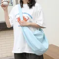 Stylish light blue bubble textured crossbody dumpling bag for women in casual Korean style - Dumpling Bag Style / Blue
