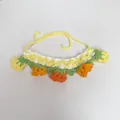 Handmade knitted pet collar featuring colorful lily of the valley flower design - Lily Of The Valley Bib / Yellow Lily Of The Valley Bib