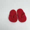 Detail of handmade red crochet baby flip-flops for newborn photography props - Red