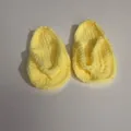 Detailed macro view of hand-crocheted yellow wool baby flip-flops for newborn photography - Light Yellow