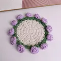 Close-up of handmade crochet flower coaster with purple roses - Rose Coaster / Purple