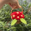 Handmade mini crochet flower basket with red puff flowers and green leaves for decor - Puff Flower Basket / Red
