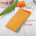 Yellow leather sunglasses pouch with automatic closure measuring 9cm by 17.5cm SKU - 18x9cm / Orange