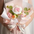 Handmade crochet rose flower bouquet wrapped in pink paper with elegant ribbon bow - Gradient Pink Bouquet