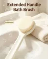 Macro view of long-handled soft-bristled bath brush in a clean and soapy bathroom setting - 1 Pack / White