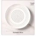 Macro-opname van een witte geperforeerde keramische stoomplaat met een diameter van 20 cm - 20cm Maat / Wit
