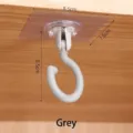 Gancio da soffitto girevole grigio a 360 gradi con base adesiva trasparente da 8,5x7,5 cm - Grigio