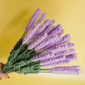 Handmade crochet lavender bouquet for home decor, featuring purple yarn flowers and green stems - Dark Violet
