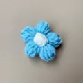 Handmade blue and white knitted yarn flower decoration for hair clips and brooches - Blue Flower With White Center