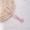 Cordón de muñeca trenzado rosa hecho a mano para teléfono o botella con anillo - Tejido a Mano / Rosa