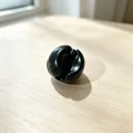 Detailed macro view of black spherical slot component for suction cup toothbrush holder - 2 Pcs/Set / Black