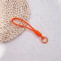 Handmade vibrant orange braided wrist lanyard for phone with metal spring ring clasp - Hand-woven / Orange