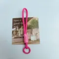 Short pink braided phone lanyard keychain with a circular plastic ring clip for bags - Rose Red