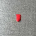 Red mini minimalist shield-shaped plastic adhesive wall hook for keys and small items - 1 Piece / Red