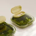 Tragbare Mini-Medikamentenbox in Grün, transparent mit Reisefächern für Tabletten - 4 Gitter / Transparentes Cyan