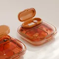 Tragbare bernsteinfarbene Pillenbox mit mehreren Fächern für tägliche Reisemedizin - 4 Gitter / Transparentes Rot