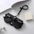 Estuche de cuero negro para gafas de sol con correa de transporte y herrajes metálicos - 16X8cm / Negro