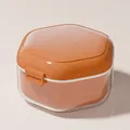 Hexagonal orange portable orthodontic retainer storage case with transparent base for dentures - Orange