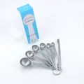 7-piece stainless steel measuring spoon set with a leveling ruler and blue storage box - 7-Piece Set in Color Box