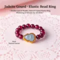 Elastic bead ring featuring 4mm red garnet beads and a carved green jade gourd charm - Garnet Style (Gourd) / 4MM Bead Diameter / Burgundy