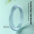 Elegant 11.5mm wide light blue cat's eye stone bangle with a translucent finish - Cat's Eye Bangle / 54mm Inner Diameter / Icy Blue