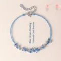 Elegant blue braided rope bracelet with marquise-cut crystal flower charms - Crystal Flower Hand Rope / Blue