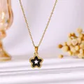 Elegante goldene Edelstahl-Halskette mit Sternanhänger, schwarzer Emaille und Hohlzentrum - Goldene Schwarzöl Pentagramm Halskette