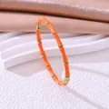 Elegante oranje emaille bamboe armband van duurzaam roestvrij staal voor trendy dames - Metallic oranje