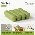 Green silicone ice cube tray featuring 4 long strip molds for easy release DIY ice making - Strip Popsicle Mold / Green