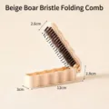 Portable beige folding boar bristle hairbrush for travel and daily styling use - Beige