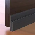 Dark gray self-adhesive door bottom seal strip for soundproofing and draft protection - 1-Piece / 90cm / Black