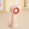 Cute pink handheld mini fan featuring a cartoon bunny decoration and quiet turbo motor - Rabbit / Pink