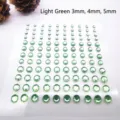 Detalle de pegatinas de diamantes de imitación acrílicos verde claro en tamaños 3, 4 y 5 mm - Paquete Mixto 3mm 4mm 5mm / Verde claro