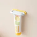 Wall-mounted multi-functional toothpaste squeezer holder in blue and yellow finish - Blue-Yellow