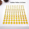 Detalle de diamantes de imitación acrílicos de color amarillo dorado en tamaños 3, 4 y 5 mm - Paquete Mixto 3mm 4mm 5mm / Dorado
