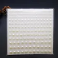 Hoja de pegatinas de medias perlas marfil de tamaños mixtos para maquillaje facial y DIY - Perla Artificial (175 Piezas)