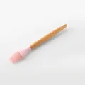 Professional pink silicone pastry brush with a natural wooden handle for kitchen baking. - Oil Brush