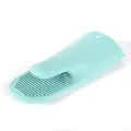 Heat-resistant mint green silicone oven mitt with anti-slip texture for kitchen baking. - Green