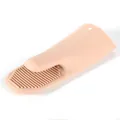 Heat resistant peach silicone oven mitt with anti-slip ribbed texture for safe baking and cooking - Pink
