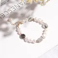 Elegant irregular freshwater pearl bracelet with green aventurine crystals - Three Pearls Black Rutilated Quartz Bracelet