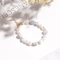 Elegant bracelet featuring irregular freshwater pearls and light blue stone beads - Three Pearls Purple Agate Bracelet