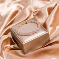 Elegant pink tourmaline beaded bracelet with gold magnetic clasp on luxury jewelry box - Strawberry Quartz (Magnetic Clasp)