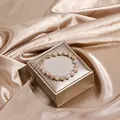 Elegant handmade wire-wrapped gemstone bead bracelet with adjustable gold chain - Cherry Blossom Agate (Adjustable)