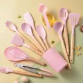 14-piece pink silicone kitchen utensil set with wooden handles and a matching storage bucket - 14 Pieces (Includes Spoon Rest + Egg Separator) / Pink