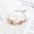 Elegant 14k gold-filled bracelet with pink strawberry quartz and white beads - One Size / Strawberry Quartz and Moonstone Style